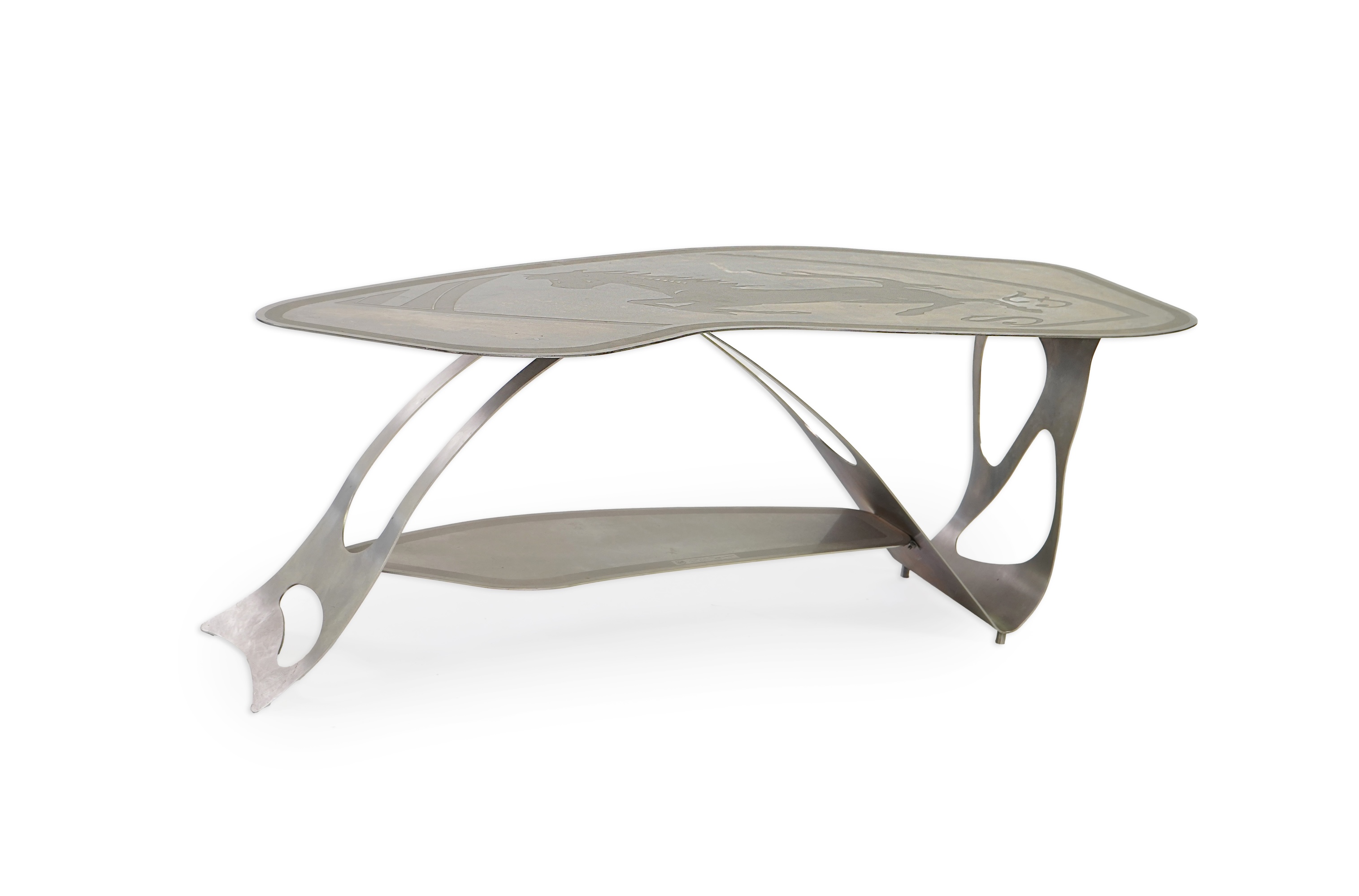 Pietro Psaier (Italian 1939-2004) A Ferrari polished steel coffee table, 1 of 3, in homage to Carlo Mollino